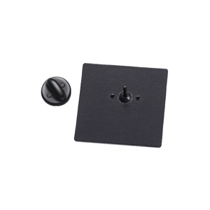 Macro shot of square black enamel pin back with standard rubber clutch fastener