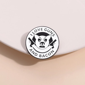 Macro detail of enamel pin showing cool pig with gun and I Love Guns and Bacon text