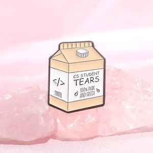 Milk carton enamel pin with CS STUDENT TEARS text on a pink crystal background