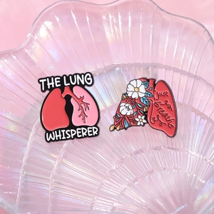 Lungs enamel pin set with The Lung Whisperer and Just Breathe text on shell tray