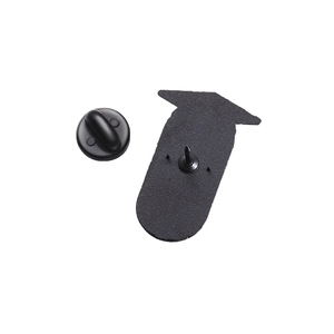 Detailed back view of enamel pin showing needle and black rubber clutch attachment