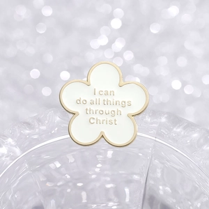 White flower enamel brooch with golden edges and inspirational Bible verse text