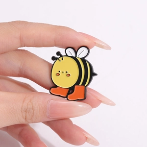 Cute cartoon bee enamel brooch pin with yellow body and orange boots for kids and adults