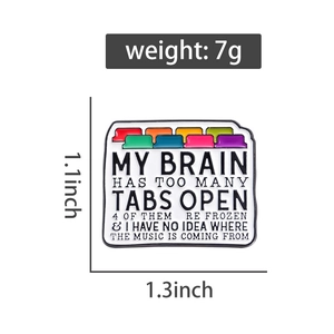 Macro detail of enamel folder brooch with dimensions showing 1.1 inch height and 1.3 inch width