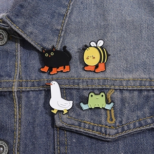 Cute cartoon animal enamel pins set with bee cat goose and frog on denim jacket