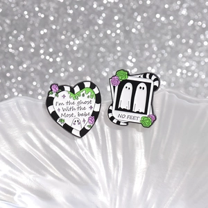 Ghost enamel pin set with Beetlejuice quote and Polaroid design on white shell tray