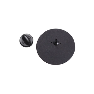 Close-up of matte black metal badge backing pins with secure rubber clutch backings