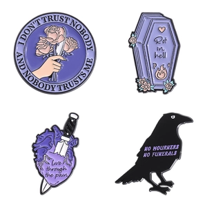 Gothic enamel pin set with Best Friends coffin and raven designs on white background