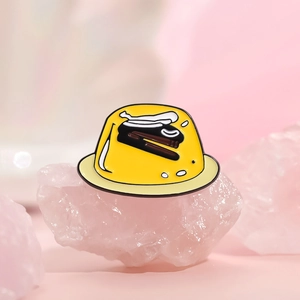 Cute yellow pudding enamel pin on pink crystal stone for office stationery and clothing