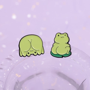 Funny cartoon frog enamel pins with lotus leaf design and creative upside-down pose