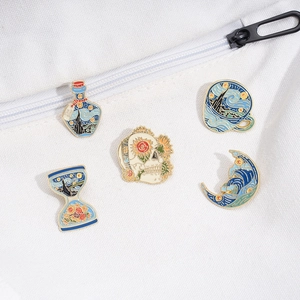 Artistic oil painting enamel pins featuring Van Gogh star and sunflower motifs on bag