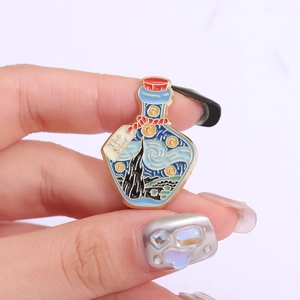 Artistic oil painting bottle enamel pin featuring Van Gogh Starry Night style design