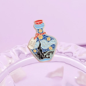 Artistic Van Gogh Starry Night enamel brooch in a glass bottle design on purple tray