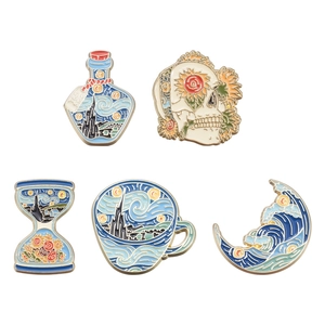 Artistic enamel pins set with Van Gogh Sunflowers and Starry Night inspired designs