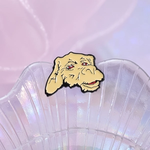 Enamel Falkor dragon badge pin for clothing and bags with shimmering pearl background