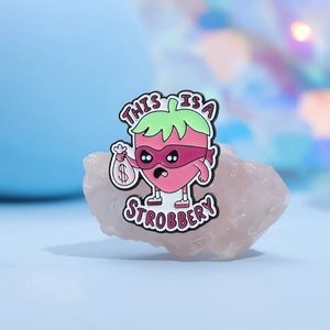 Creative strawberry cartoon enamel pin with This Is A Strobbery text for backpacks