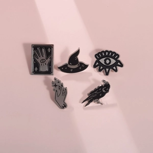 Detailed set of five black enamel gothic pins featuring a raven, witch hat and mystic palm