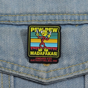 Cartoon enamel pin with lightning man on denim jacket featuring Pew Pew Madafakas text