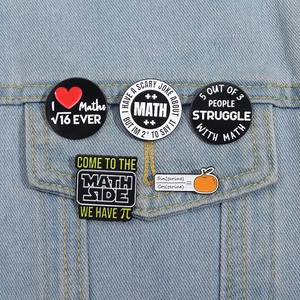 5Pcs funny math enamel pins set featuring creative formulas on blue denim jacket
