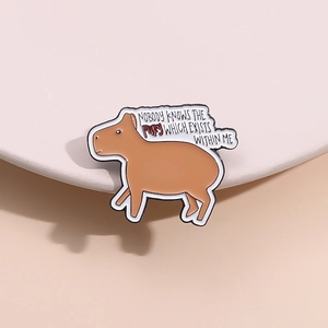 Detail of Capybara enamel pin with funny slogan for backpack and jacket decor