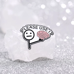 Cartoon stickman enamel pin with brain and Please Use It text on white crystal stone