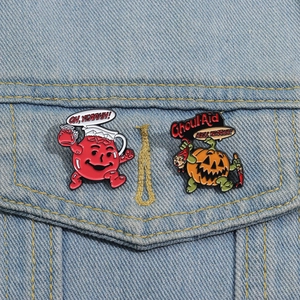 Detail of Halloween enamel pins with Kool-Aid parody on a blue denim jacket