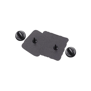 Detail view of double needle pins and black matte butterfly clutches for enamel brooch pin