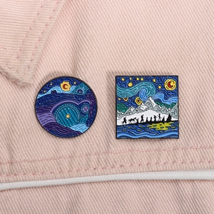 Detail view of Van Gogh style enamel pins on pink denim, featuring Hobbit movie scenes