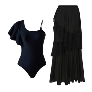 Detail of black one-shoulder ruffled swimsuit with matching tiered maxi skirt cover-up