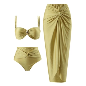 Three-piece gold bikini set with twist top, high-waist bottoms and matching sarong skirt