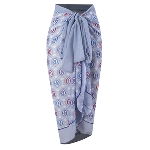 Detailed view of light blue paisley print wrap skirt with front bow tie and dark blue trim