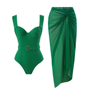 Detail of emerald green swimsuit with heart neckline and matching mesh skirt set