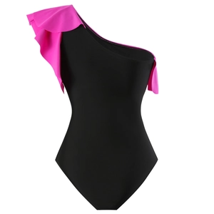 Detail of ruffle shoulder design on black and pink one-piece swimsuit for women