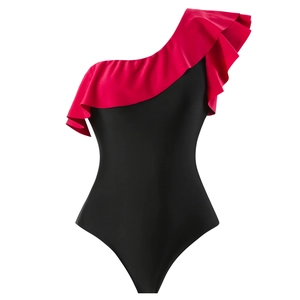Detail of red ruffle neckline and sleek black one-shoulder swimsuit fabric