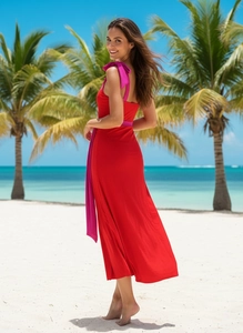 Detail of red one-piece swimsuit with pink bow shoulder strap and ruffled texture