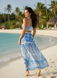 Detail view of blue tropical floral print two-piece beach set with high-waist maxi skirt