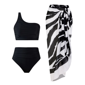 Three-piece black one-shoulder bikini set with high waisted bottom and zebra sarong