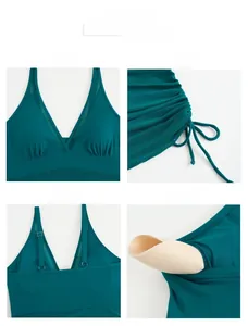 Detail view of deep green swimsuit with mesh V-neck, adjustable straps, and side drawstrings