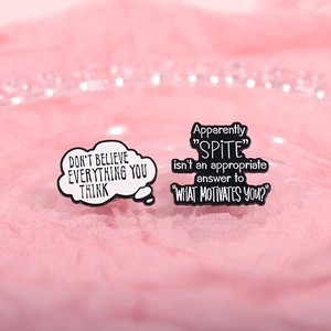 Quote enamel brooch set with Don't Believe Everything You Think and Spite quotes