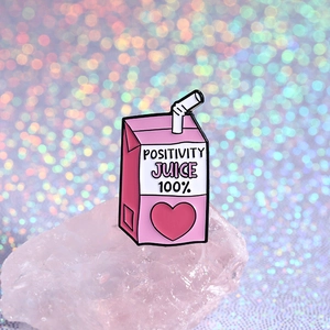Pink positivity juice enamel pin with a cute straw on a pastel crystal base