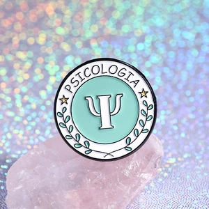 Psychology Psi symbol enamel pin badge with mint green background and gold stars