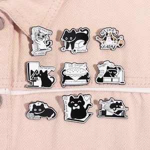 Set of nine black and white cat enamel pins featuring humorous manga-style illustrations