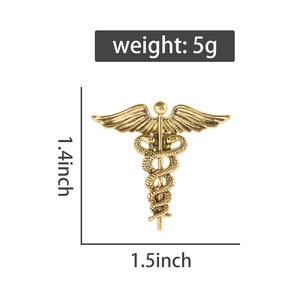 Macro view of vintage gold medical caduceus pin with measurements and weight