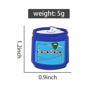 Macro shot of Sana Sana ointment jar enamel pin showing exact dimensions and weight
