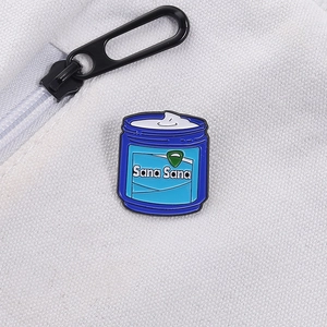 Cartoon blue cream jar enamel brooch pin with Sana Sana text on canvas background