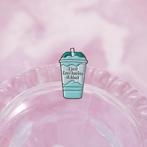Mint green Baja Blast drink enamel pin with I just Love having A blast lettering