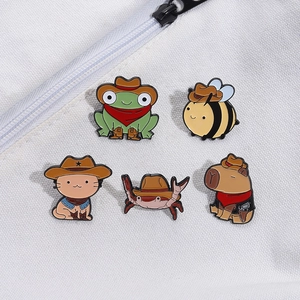 Set of 5 cute cartoon animal enamel pins wearing cowboy hats on a canvas bag background