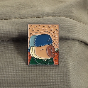 Artistic enamel pin depicting Capybara as Van Gogh self-portrait on green fabric