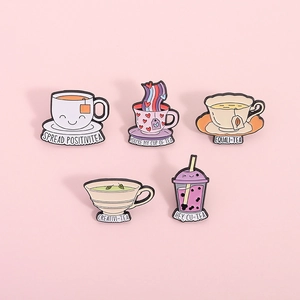 Set of 5 enamel pins featuring creative tea and bubble tea designs with cute puns