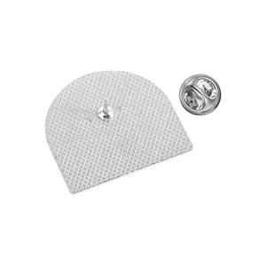 Detail of metal pin back showing silver texture and standard butterfly clutch backing